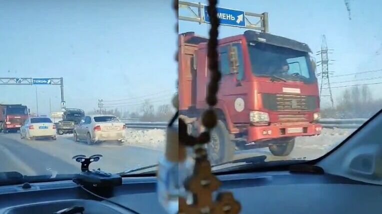 В Тюмени на Объездной дороге в аварию попали внедорожник с прицепом и самосвал 